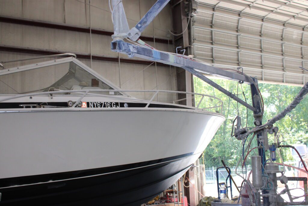 Close up of black and white speed boat.